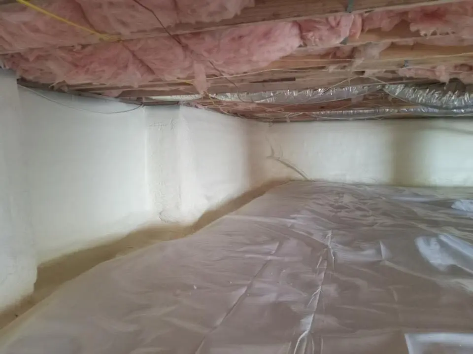Crawl space encapsulation with closed-cell spray foam for Commercial Roof Restoration in Vandalia